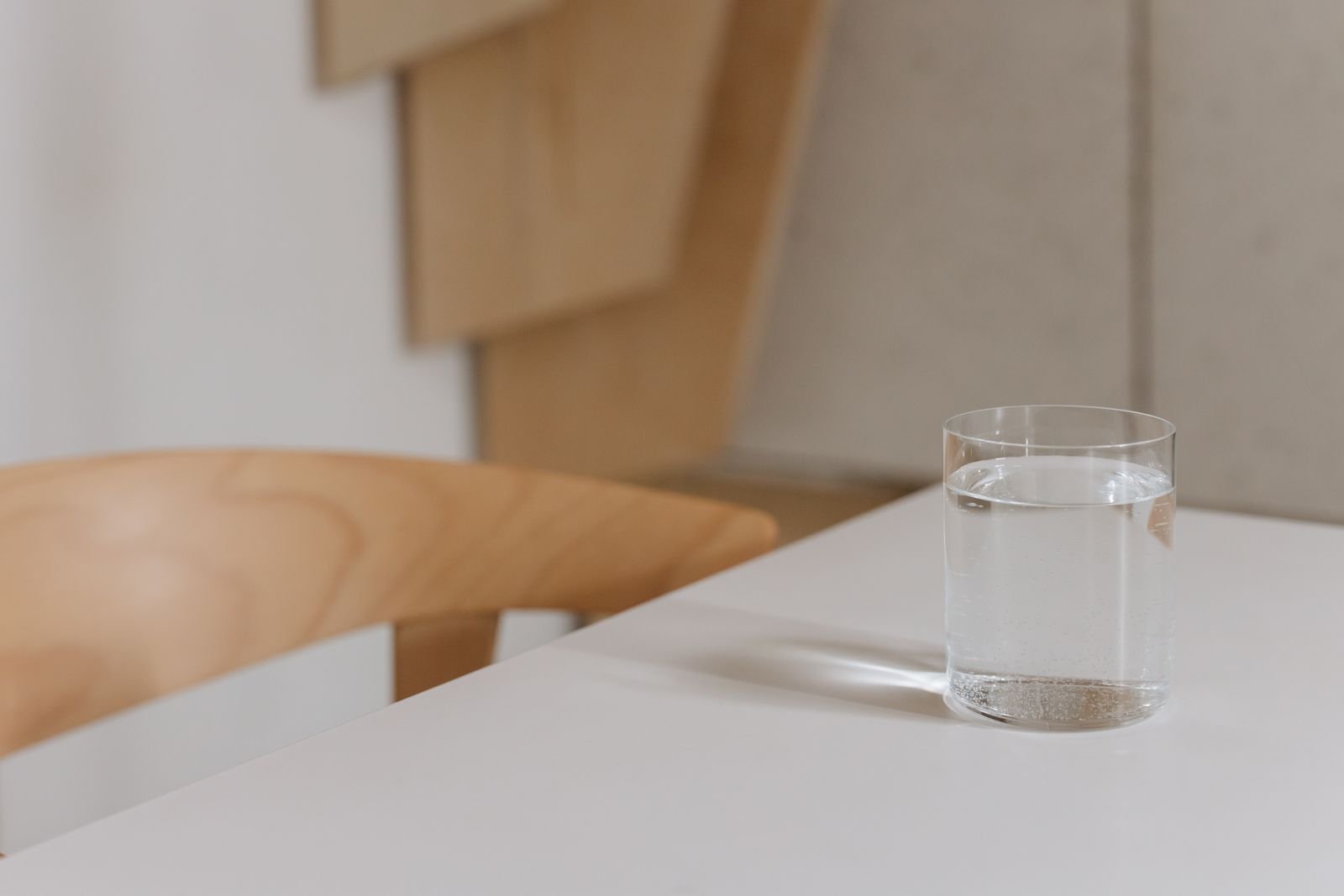 A glass of water on a white table